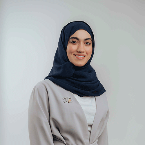 High resolution photo of Bahraini Architect Zainab Osama, wearing professional outfit and working for A grade architecture and engineering construction company in Bahrain