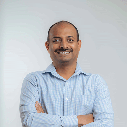 High resolution photo of male Architect draftsman, wearing professional outfit and working for A grade architecture and engineering construction company in Bahrain