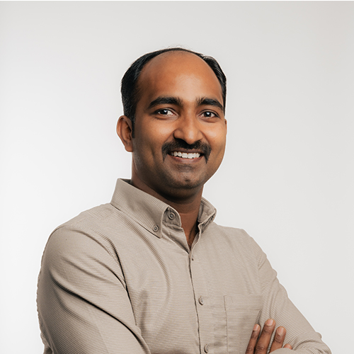 High resolution photo of male Architect draftsman, wearing professional outfit and working for A grade architecture and engineering construction company in Bahrain